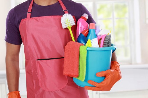 Professional cleaners preparing a Kensington home for a thorough clean