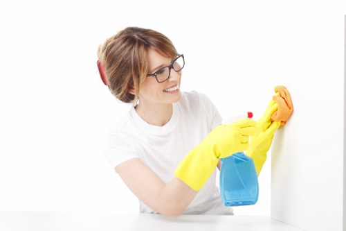 Team following health and safety procedures during cleaning tasks