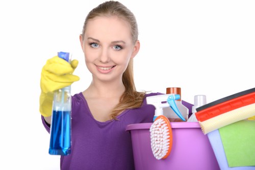 Trained cleaner carrying out a safe cleaning task in Kensington